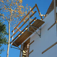 Genesis Safety System fascia railing in use seen from 3 floors below.